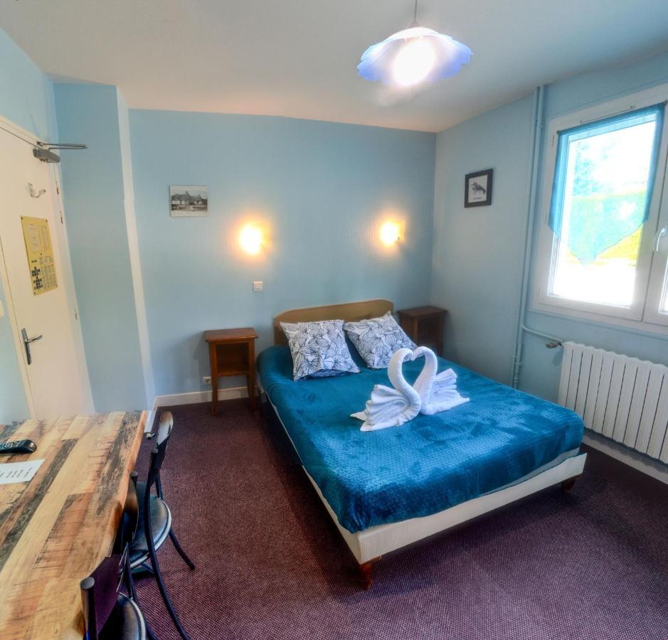 Hotel Le Pommeil Gueret Bagian luar foto